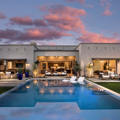 Inspiration for a contemporary backyard tile and rectangular lap pool remodel in Phoenix