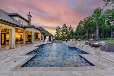 Example of a large transitional backyard stone and rectangular natural hot tub design in Houston
