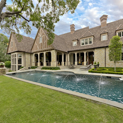 Inspiration for a timeless backyard rectangular pool remodel in Dallas