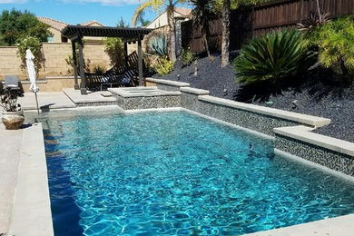 Hot tub - mid-sized traditional backyard rectangular hot tub idea in Los Angeles