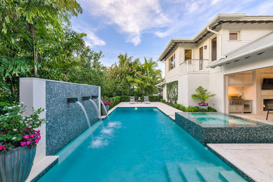 Inspiration for a transitional pool remodel in Miami