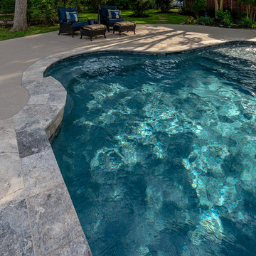 Travertine Coping and Blue Surf Pebble Tec