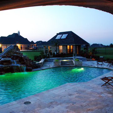 Travertine Geometric Pool with Rock Slide and Grotto