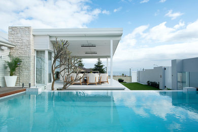 Inspiration for a mid-sized coastal pool remodel in Perth