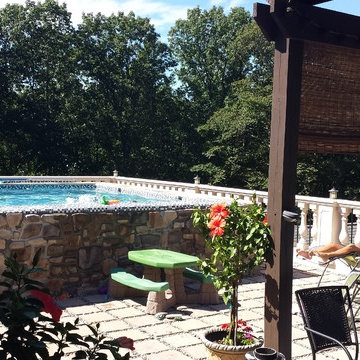 Tuscan style glass bottom rooftop pool