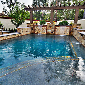 Pool w/ Arbor Backdrop and Above Ground Hot Tub