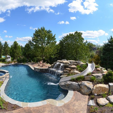 Upper saucon pool with waterslide and swim up bar