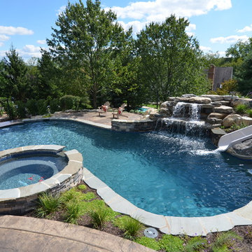 Upper saucon pool with waterslide and swim up bar