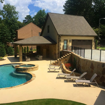 View Across Pool to Outdoor Kitchen & Pool House