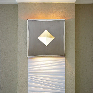 Von uns entworfene Decken- und Wandlampe