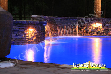 Example of an eclectic pool design in Charlotte