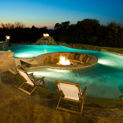Inspiration for a timeless custom-shaped pool remodel in Dallas