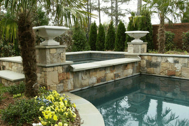 Inspiration for a large victorian backyard stone and rectangular lap hot tub remodel in Atlanta