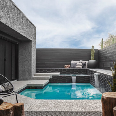 Pool fountain - contemporary custom-shaped pool fountain idea in Phoenix