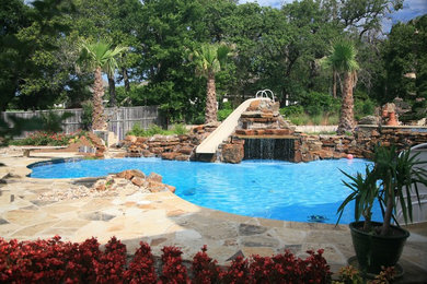 Inspiration for a rustic pool remodel in Dallas