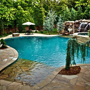 Example of a tuscan custom-shaped pool design in Oklahoma City