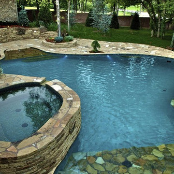 Waterfalls Connect Oklahoma Home to Pool