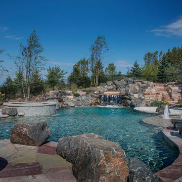West Bend, WI Waterfront Freeform Pool and Hot Tub