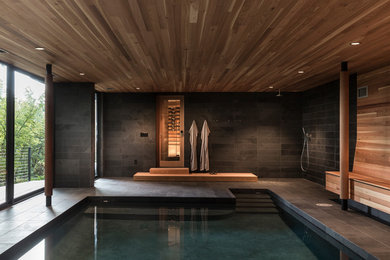 Inspiration for a contemporary indoor rectangular swimming pool in Portland.