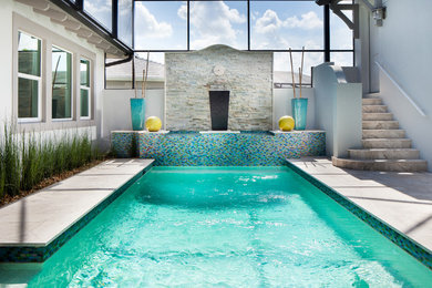 Photo of a mediterranean rectangular swimming pool in Miami.