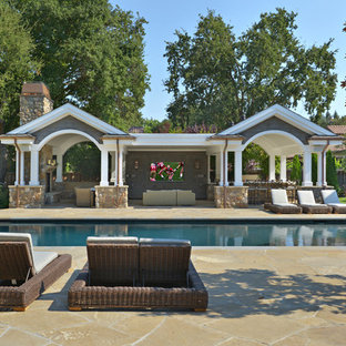 Inspiration for a mid-sized arts and crafts backyard rectangular lap pool in San Francisco with natural stone pavers.