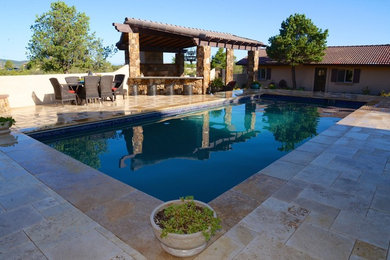 Inspiration for a large contemporary backyard tile and rectangular lap hot tub remodel in Phoenix