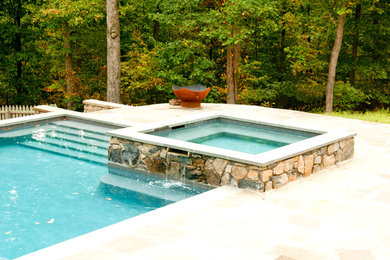 Large elegant backyard tile and rectangular aboveground hot tub photo in DC Metro