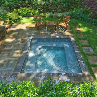 Inspiration for a timeless stone and rectangular pool remodel in New York