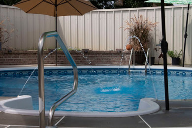 This is an example of a retro swimming pool in Other.