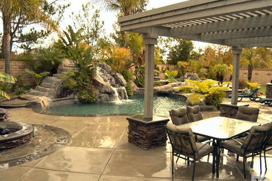 Example of an arts and crafts pool design in Orange County