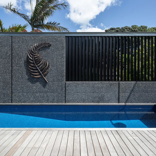 Idee per una piscina fuori terra industriale rettangolare di medie dimensioni e sul tetto con pedane