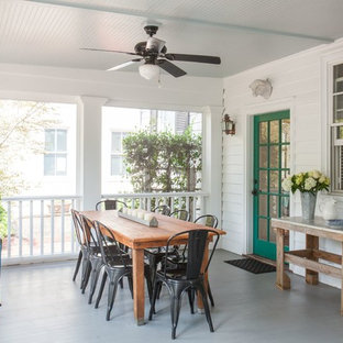 Inspiration for a shabby-chic style porch container garden remodel in Other with a roof extension