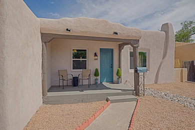 Minimalist concrete front porch photo in Albuquerque