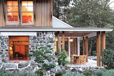 Mountain style porch photo in San Francisco with a roof extension