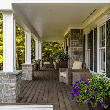 An expansive front porch is a relaxing space to recharge and entertain