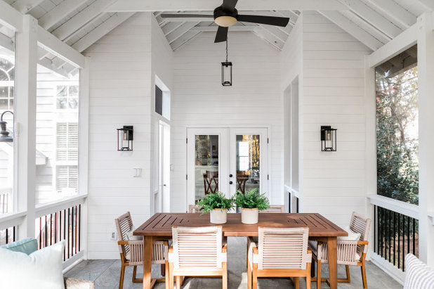 Rustic Porch by Catherine French Design, LLC.