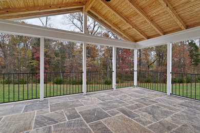 Large transitional porch photo in DC Metro