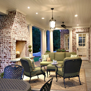 Classic porch idea in Atlanta with a fire pit
