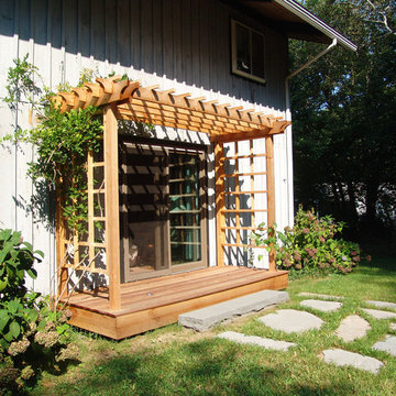 Backyard Renovations- Arbor and deck