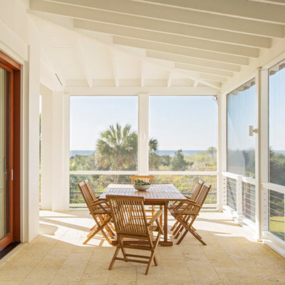 Beach style tile screened-in porch photo in Charleston with a roof extension