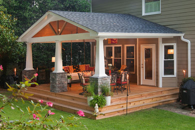 Mid-sized arts and crafts back porch photo in Atlanta with decking and a roof extension