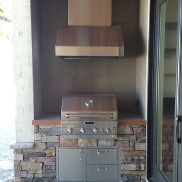 Built-in gas grill on one of 3 back porches.