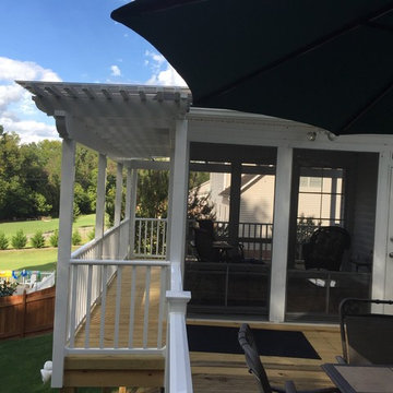 Clemmons, NC Eze Breeze Window Room with Double White Aluminum Pergolas.