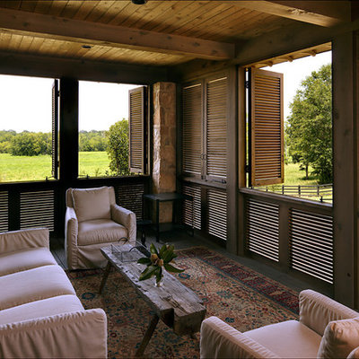 This is an example of a farmhouse porch design in Birmingham with decking and a roof extension.
