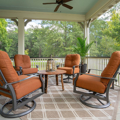 Inspiration for a farmhouse side porch remodel in Atlanta with decking and a roof extension