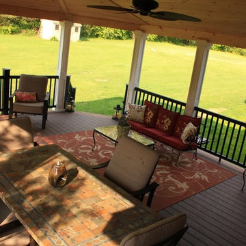 Covered Deck with Built-In Stone Fireplace