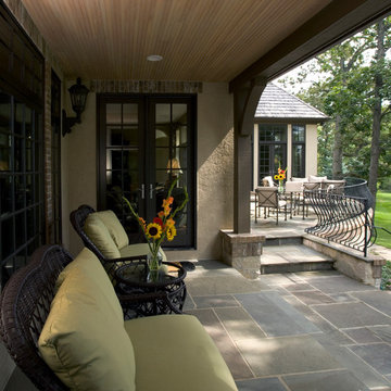 Covered Porch with Cedar Beadboard Ceiling and Blue Stone Flooring