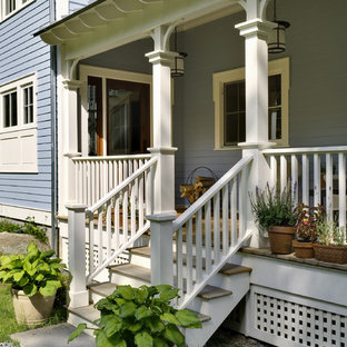 Idee per un portico chic con pedane e un tetto a sbalzo