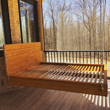 Custom built wooden bed swing for back porch