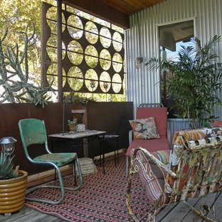 Ispirazione per un portico boho chic con un giardino in vaso